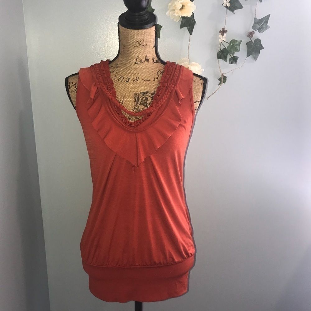 Elegant medium orange sleeveless blouse